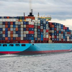 A loaded cargo ship at sea